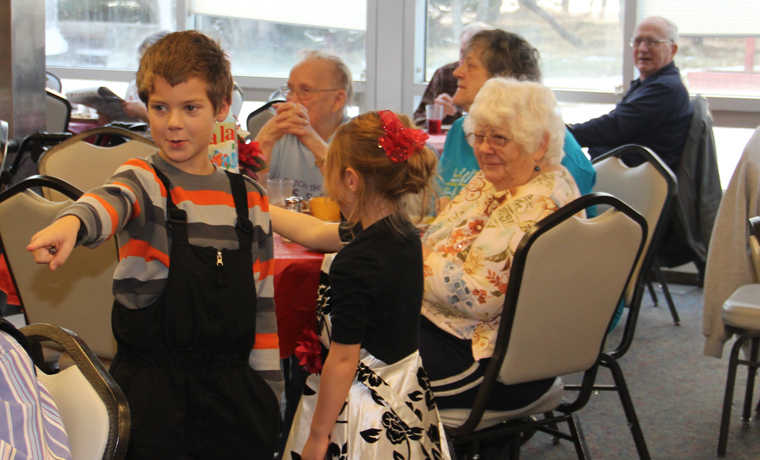 Keeping a 20-year-old tradition Cook Inlet Academy students go caroling in Kenai