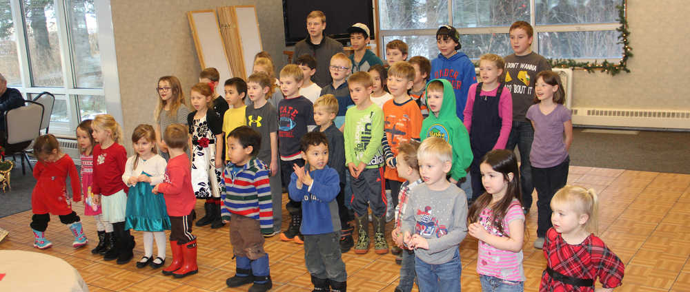 Keeping a 20-year-old tradition Cook Inlet Academy students go caroling in Kenai