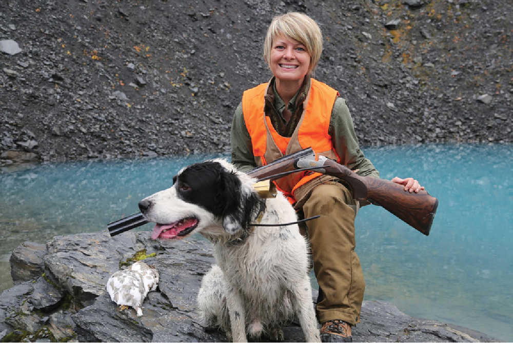 Photo courtesy Christine Cunningham This photo of Christine Cunningham while hunting in the fall of 2014. Cunningham trains and hunts with English Setters and chocolate labradors for tracking waterfowl in Alaska.