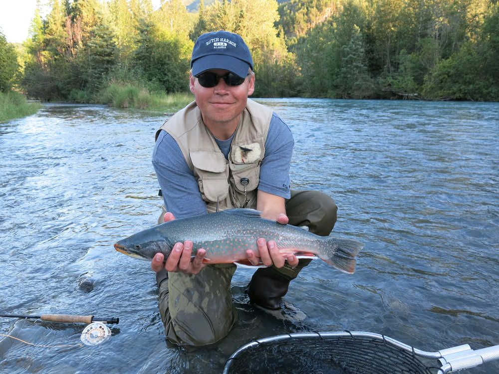 Paul Ostrander with a Kenai River Dolly Varden. (Photo by Dave Atcheson)