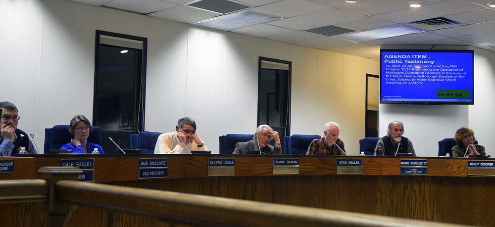 Photo by Dan Balmer/Peninsula Clarion Members of the Kenai Peninsula Borough Assembly listen to testimony Tuesday, Jan. 20, 2015 in Soldonta on the introduction of an ordinance that would be put to a vote if the borough should ban marijuana cultivation in the rural areas. The assembly set public hearing for the ordinance for Feb. 24 - the day marijuana legalization goes into effect.