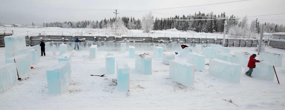 Ice blocks are lined out for the Kids Park Maze as work begins on this year's Ice Alaska Ice Park in Fairbanks, Alaska Monday, Jan. 19, 2015 in preparation for the 2015 BP World Ice Art Championships. The park opens Feb. 23. (AP Photo/Fairbanks Daily News-Miner, Eric Engman)