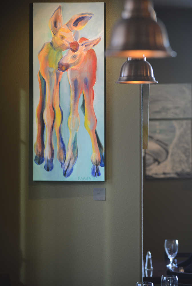 Photo by Rashah McChesney/Peninsula Clarion "Lanky Calves," by artist Kaitlin Vadla, on display at The Flats Bistro in Kenai, Alaska.
