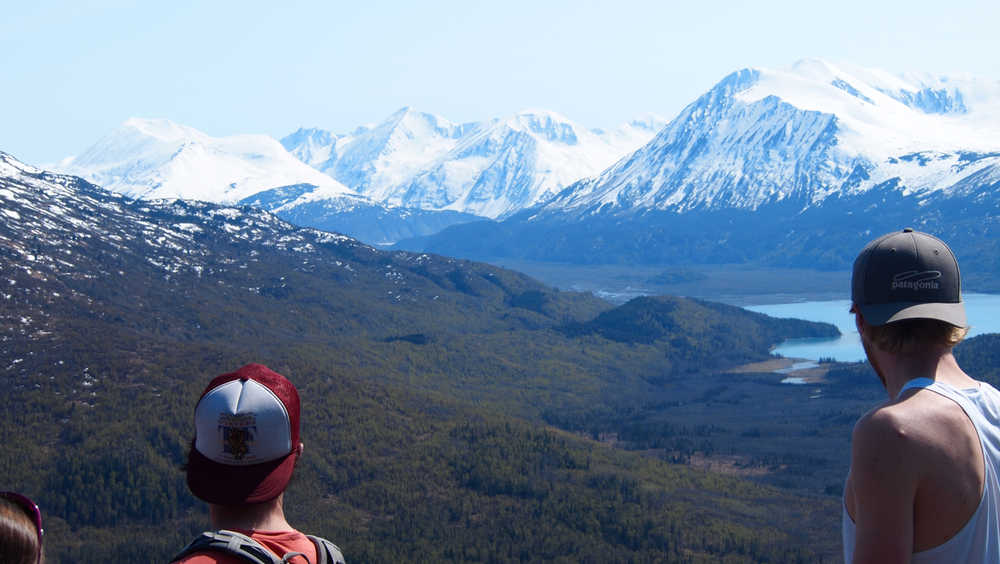 Hikers in pursuit of the Alaska Dream looking over Doroshin Bay and the Skilak Glacier outwash plain in Kenai National Wildlife Refuge. (Photo courtesy Kenai National Wildlife Refuge)