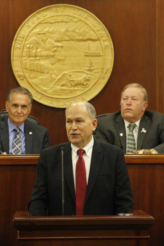 Alaska Gov. Bill Walker gives his first State of the State address Wednesday, Jan. 21, 2015, in Juneau, Alaska. Walker called on Alaskans to pull together, and not panic, as the state faces multibillion-dollar budget deficits amid a fall in oil prices. (AP Photo/Mark Thiessen)