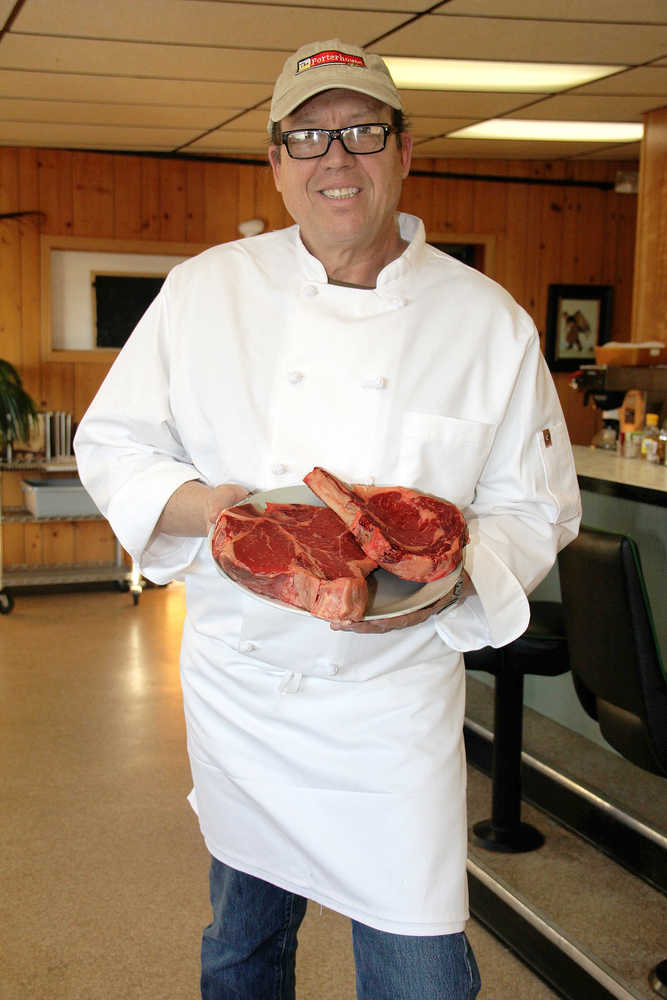 Chef Steve Drolet shows why his new steakhouse is called "The Porterhouse Grill.