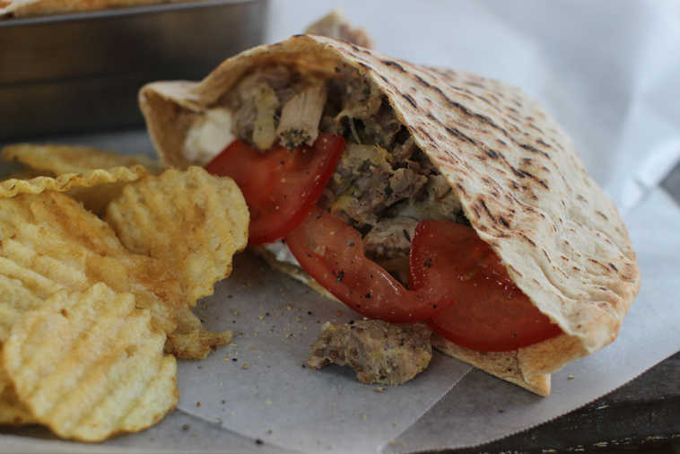 This Jan. 19, 2015 photo shows slow cooker pulled chicken Greek pitas in Concord, N.H. (AP Photo/Matthew Mead)