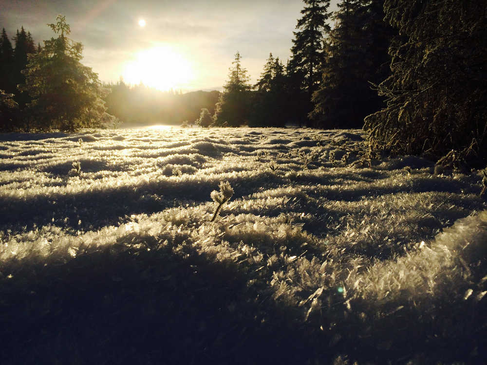 After nights of cold, clear weather, hoar frost decorates most surfaces near Peterson Lake Cabin, north of Juneau, Alaska, in this Dec., 2014, photo.  The winter of 2014-15 is not one that has yet brought large amounts of snowfall to Southeast Alaska, but even so, winter outings require attention in areas  where summer outings do not. (AP Photo/Juneau Empire, Abby Lowell)