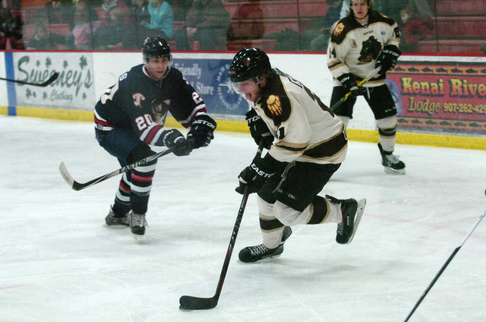 Ben Boettger/Peninsula Clarion Brown Bears forward Adam Kresl carries the puck Friday against the Johnstown (Pennsylvania) Tomahawks at the Soldotna Regional Sports Complex.