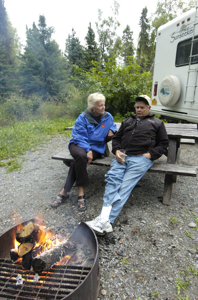 Clarion file photo Clarion file photo Kay and Howard Imsande of Brainerd, Minn., enjoy a campfire next to their RV in Centennial Campground in Soldotna in 2007. Tourism officials are expecting low gas prices to bring more RV traffic to Alaska this season.