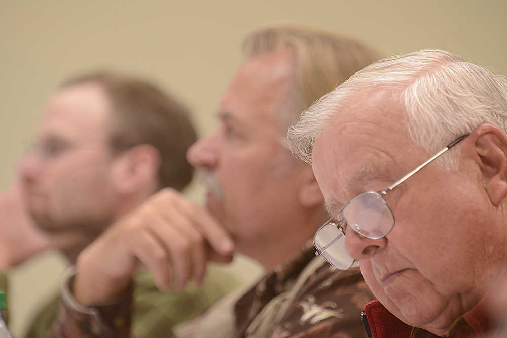 Photo by Rashah McChesney/Peninsula Clarion  In this July 21, 2013 file photo former Board of Fisheries nominee Roland Maw takes notes during a hearing. Maw recently withdrew his name from consideration for inclusion on the board and is now facing an investigation into his residency status in Alaska.