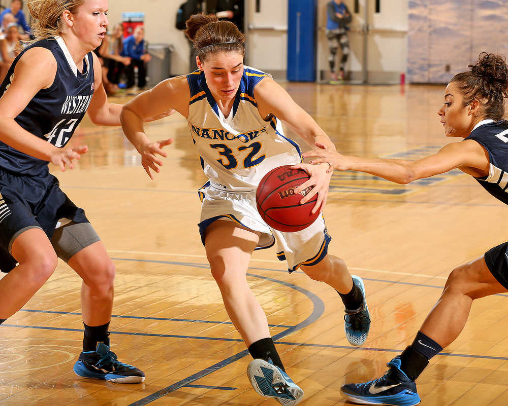 Paul McCarthy/UAF Kaillee Skjold drives the lane in a game against Western Washington.