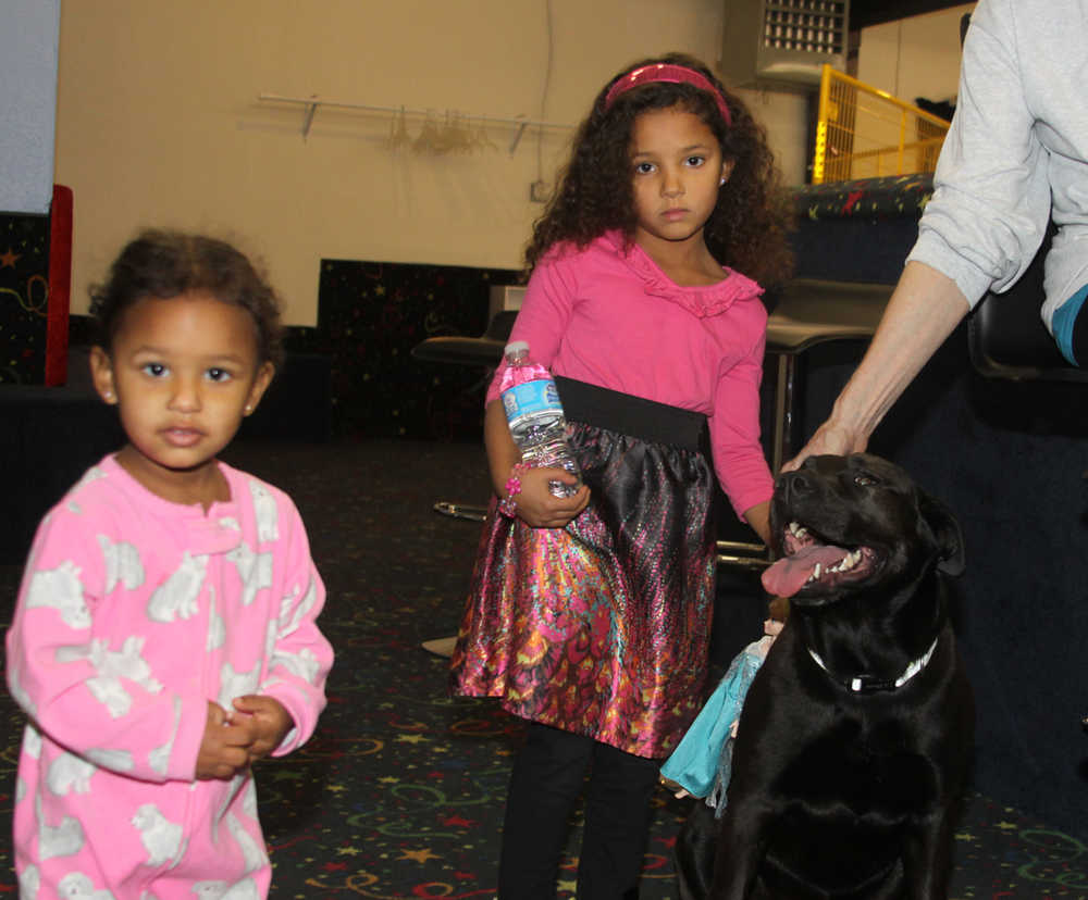 "Walkin' the Dog" at new Blue Moose Doggie Day Care Bed & Biscuit