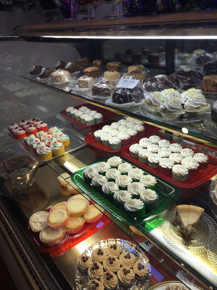Cakes and treats fill the display case at Gotta Have Desserts on Monday in Kenai.