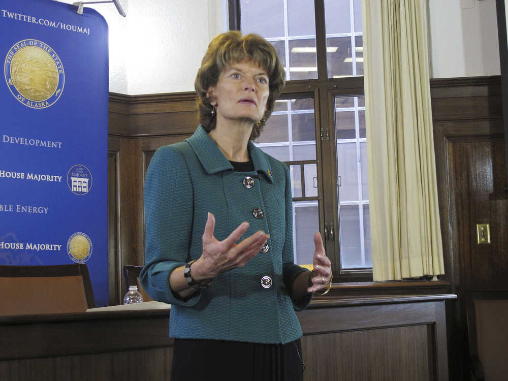 U.S. Sen. Lisa Murkowski, R-Alaska, speaks with reporters after delivering an address to a joint session of the state Legislature on Wednesday, Feb. 18, 2015, in Juneau, Alaska. (AP Photo/Becky Bohrer)