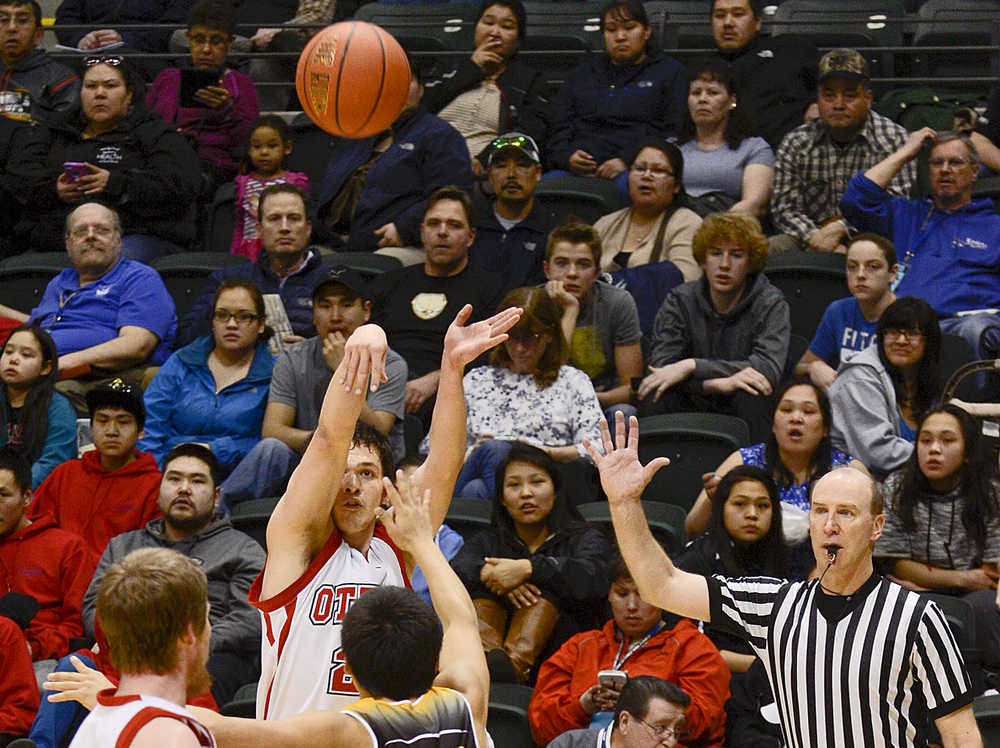 Photo by Joey Klecka/Peninsula Clarion  Seldovia's Dylan Waterbury shoots during their game against Scammon Bay on Wednesday Mach 18, 2015 in Anchorage, Alaska. Seldovia won their game and the small schools state championships 62-34.