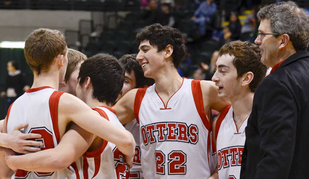 Photo by Joey Klecka/Peninsula Clarion  Seldovia players celebrate after winning their small school championship game against Scammon Bay on March 18, 2015 in Anchorage, Alaska. Seldovia won 62-34.