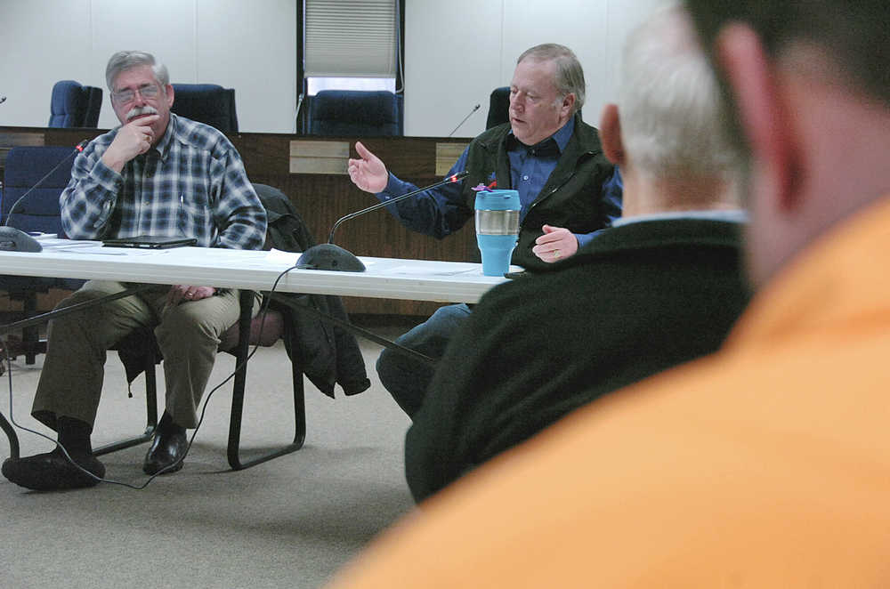 Photo by Rashah McChesney/Peninsula Clarion Rep. Kurt Olson, R-Soldotna, and Rep. Mike Chenault, R-Nikiski, hosted a legislative town hall meeting on Saturday March 21, 2015 in Soldotna, Alaska. Residents asked them to balance the budget responsibly, carefully consider marijuana regulations and to look into Medicaid expansion.