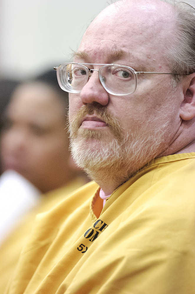 Photo by Rashah McChesney/Peninsula Clarion In this May 8, 2012 file photo, Frank Roach, listens to the proceedings during his arraignment on charges that he stole donation money meant for deployed soldiers through his organization "Alaska Veterans Outreach Boxes for Heroes." After nearly three years of representation changes and trial delays, Roach's trial began on Tuesday March 25, 2015 in Kenai, Alaska.