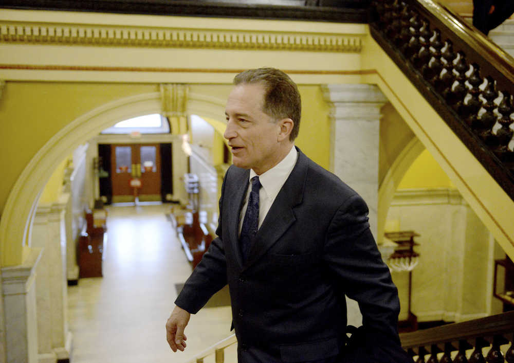 Michael Henninger/Post-Gazette  Common Pleas Judge Paul Pozonsky exits the courtroom after pleading guilty to several charges involving the theft of cocaine evidence at the Washington County Courthouse on Friday, March 20, 2015 in Washington, Pennsylvania.