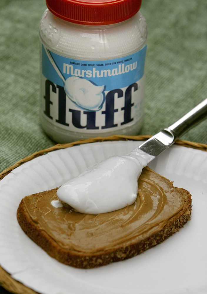 FILE - In this Tuesday, June 20, 2006 file photo, ingredients of a Fluffernutter sandwich -- Marshmallow Fluff, peanut butter and bread -- are shown in Marlborough, Mass.  Massachusetts lawmakers are considering  the sandwich as the state sandwich. When New Hampshire lawmakers this month shot down as frivolous a group of fourth-graders' effort to name the red-tailed hawk the official state raptor, the pols got pasted as insensitive bullies. But in a state with an official tree, bird, dog, animal, insect, amphibian, butterfly, saltwater fish, freshwater fish, rock, mineral, gem and, yes, tartan, some say the legislators have a point.  (AP Photo/Bill Sikes, File)