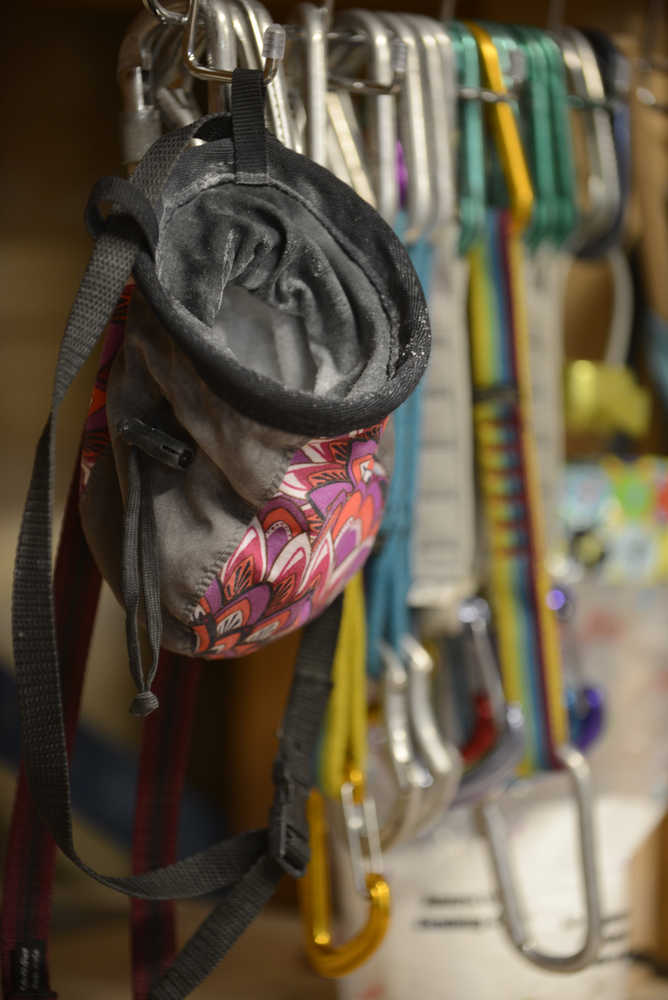 Photo by Rashah McChesney/Peninsula Clarion A rack of gear hangs at Redoubt Rock Climbing in Nic and Natalie Larson's home on Wednesday April 1, 2015 in Soldotna, Alaska. The Larsons offer climbing lessons and open gym periods in their Soldotna home.