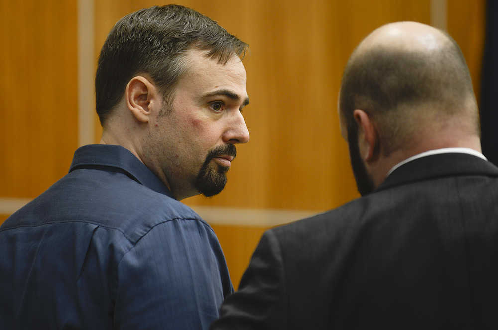 Photo by Rashah McChesney/Peninsula Clarion Shane Heiman, of Soldotna, talks to his public defender on Wednesday April 8, 2015 during the jury selection portion of his trial on charges that he attempted to kidnap and rape a Soldotna woman.
