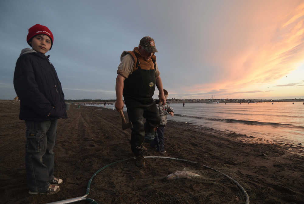 Photo by Rashah McChesney/Peninsula Clarion  In this July 19, 2013 file photo, personal use dipnetters work the Kasilof River in Kasilof, Alaska.