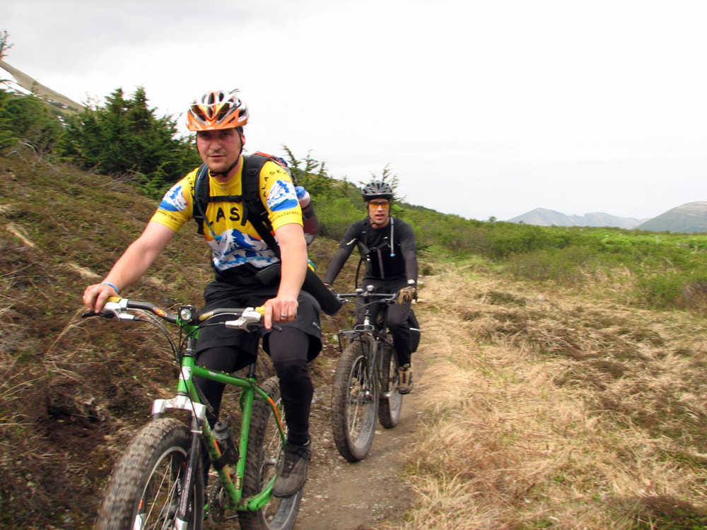 This 2006 photo provided by ArcticCycles.com shows Arctic Cycles guiding a fat-tire biking trip in the summer in south central, A.K. Fat bikes are the ultimate year-round adventure bikes. (AP Photo/ArcticCycles.com, Erica Koitzsch)