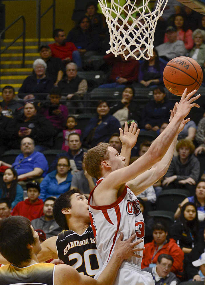 Photo by Joey Kleck/Peninsula Clarion Seldovia's Aidan Philpot shoots during their championship game against Scammon Bay on Wednesday March 18, 2015 in Anchorage, Alaska. Seldovia won their game and the state's small schools championships 62-34.