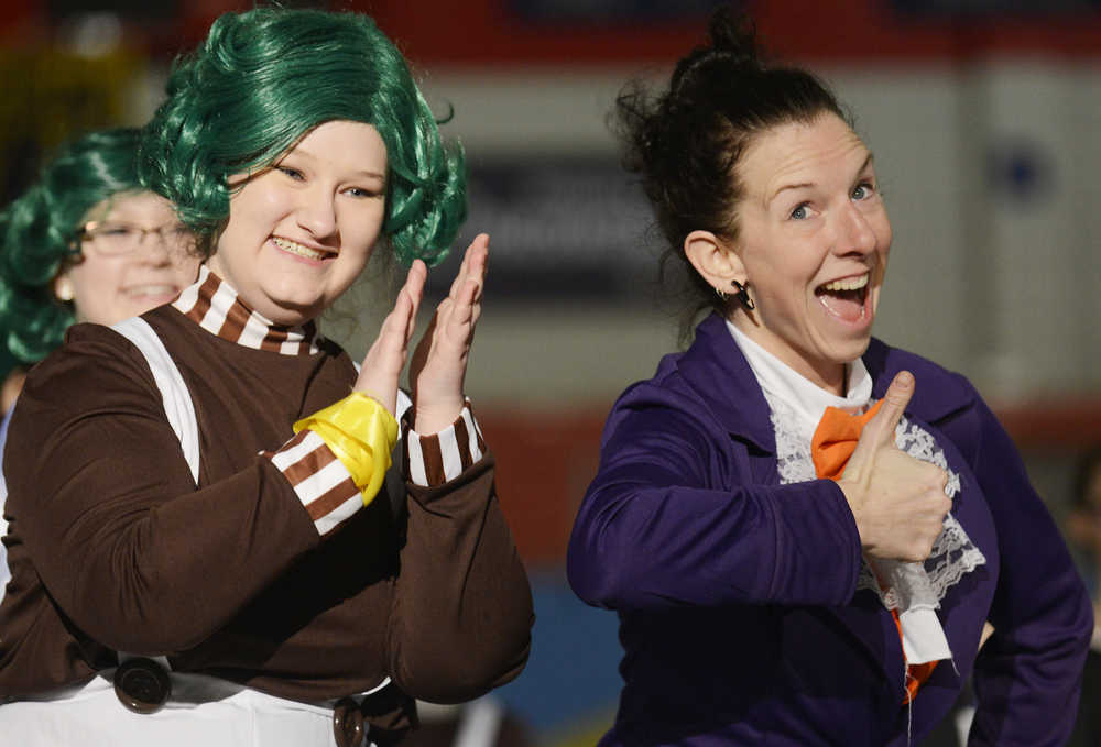 Photo by Kelly Sullivan/ Peninsula Clarion Rachel Shassetz, skating as an Oompa Loompa pauses to smile next to Laleta Vidal who played Willy Wonka Sunday, April 12, 2015, during the 20th Annual Riverskate Competition at the Soldotna Regional Sports Complex in Soldotna, Alaska.