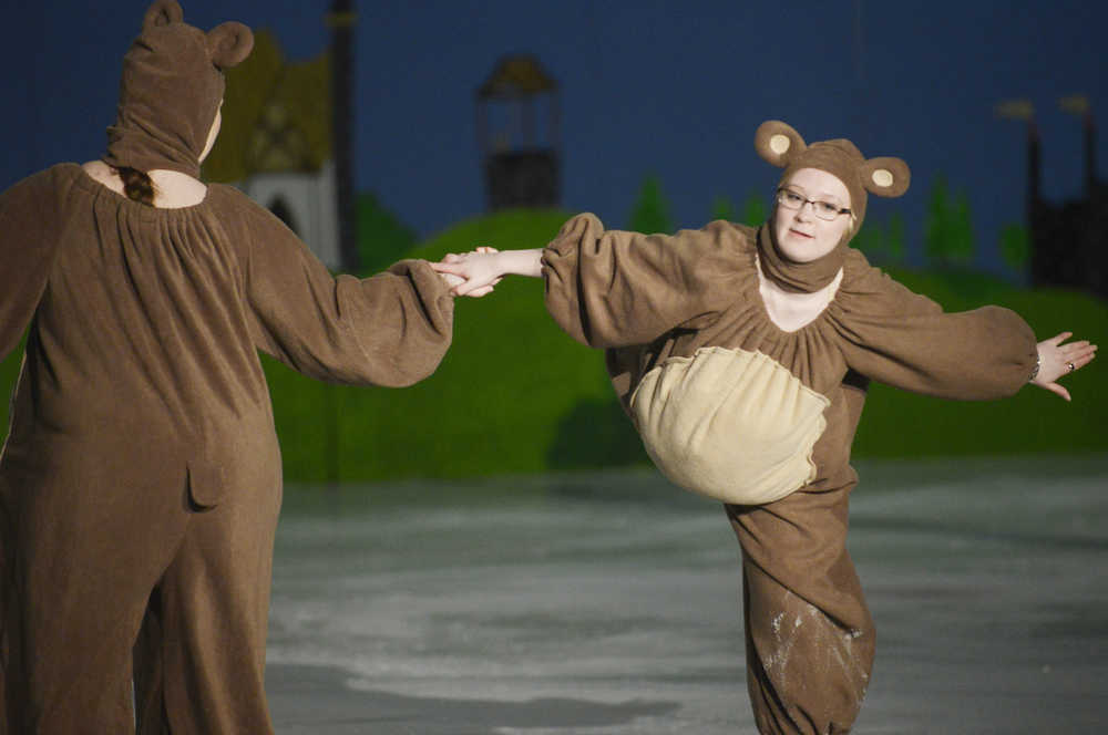Photo by Kelly Sullivan/ Peninsula Clarion Amanda Ritchie and Rachel Shassetz perform as characters from the Disney movie "Brother Bear" in a "Couples Spotlight" performance of the program Sunday, April 12, 2015, during the 20th Annual Riverskate Competition at the Soldotna Regional Sports Complex in Soldotna, Alaska.