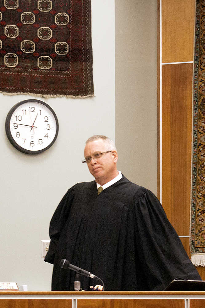 Photo by Rashah McChesney/Peninsula Clarion Kenai Superior Court Judge Charles Huguelet questions defense attorneys and bailiff's about why Shane Heiman's handcuffs were not removed before jurors re-entered the room after a break on Monday April 13, 2015 in Kenai, Alaska. Heiman's defense attorneys have moved for a mistrial.