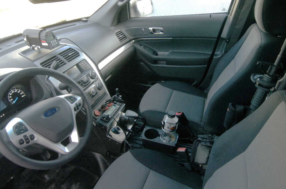 Ben Boettger/Peninsula Clarion The interior of the redesigned Kenai police car, with a reduced console and smaller post for mounting a laptop computer, photographed on Sunday, April 19 at the Kenai Police Station.