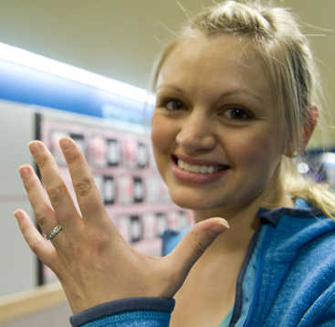 Nikki Balovich shows her platinum wedding ring that had gone missing in January, after it was returned to her Thursday, April 16, 2015, in Sitka, Alaska. The ring was returned after it was discovered in dog waste.   (James Poulson(/The Daily Sitka Sentinel via AP) MANDATORY CREDIT