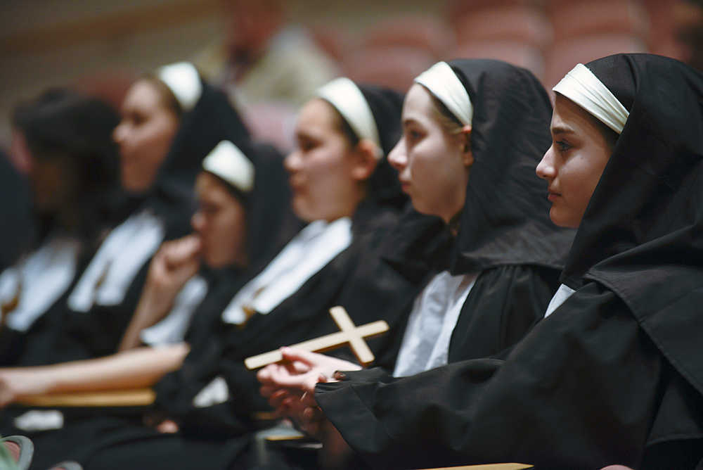 Photo by Rashah McChesney/Peninsula Clarion  Several nuns wait for their cue to go on during a dress rehearsal for the Nikiski Middle-High School musical theater class production of the "Sound of Music" on Wednesday April 22, 2015 in Nikiski, Alaska.