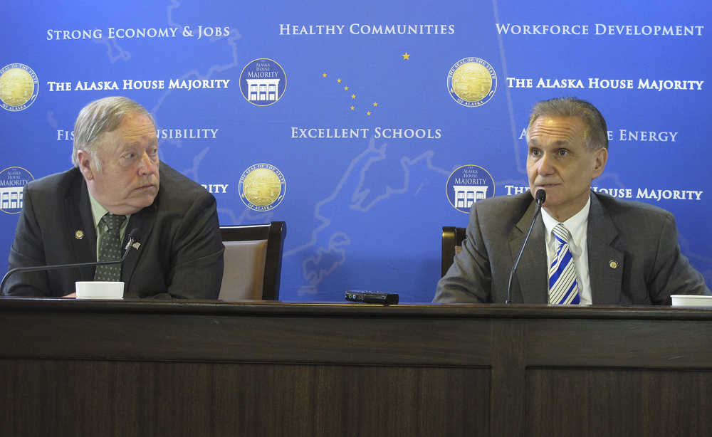 Alaska Senate President Kevin Meyer, right, and House Speaker Mike Chenault speak to reporters after the Senate passed a bill that would limit participation of a state-sponsored corporation in an alternate gas pipeline proposal by Gov. Bill Walker, Tuesday, March 31, 2015, in Juneau, Alaska. (AP Photo/Becky Bohrer)