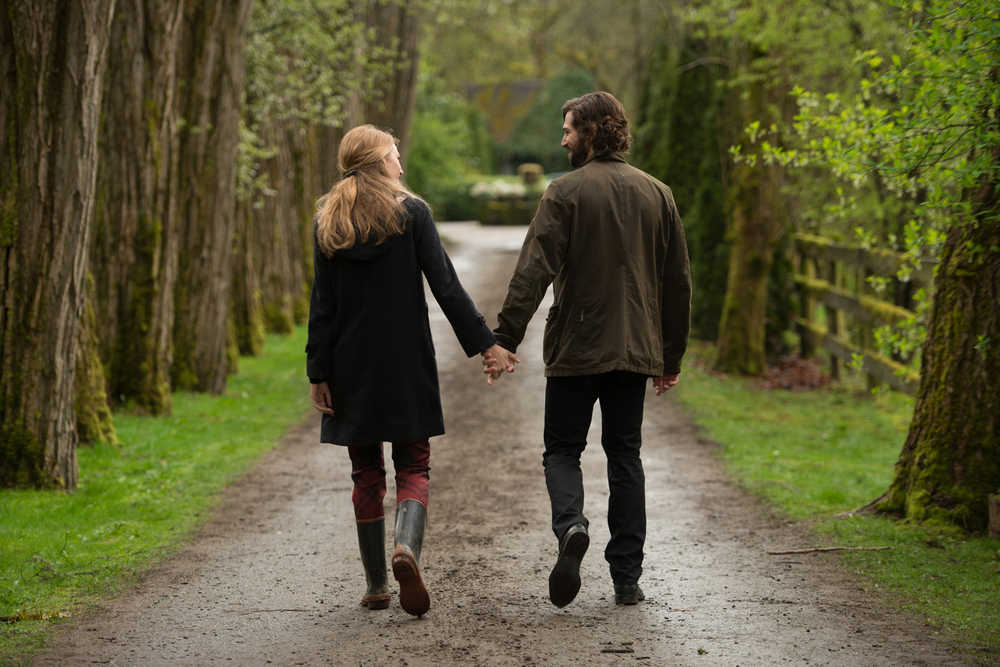 This image released by Lionsgate shows Michiel Huisman, right, and Blake Lively in a scene from "The Age of Adaline." (Diyah Pera/Lionsgate via AP)