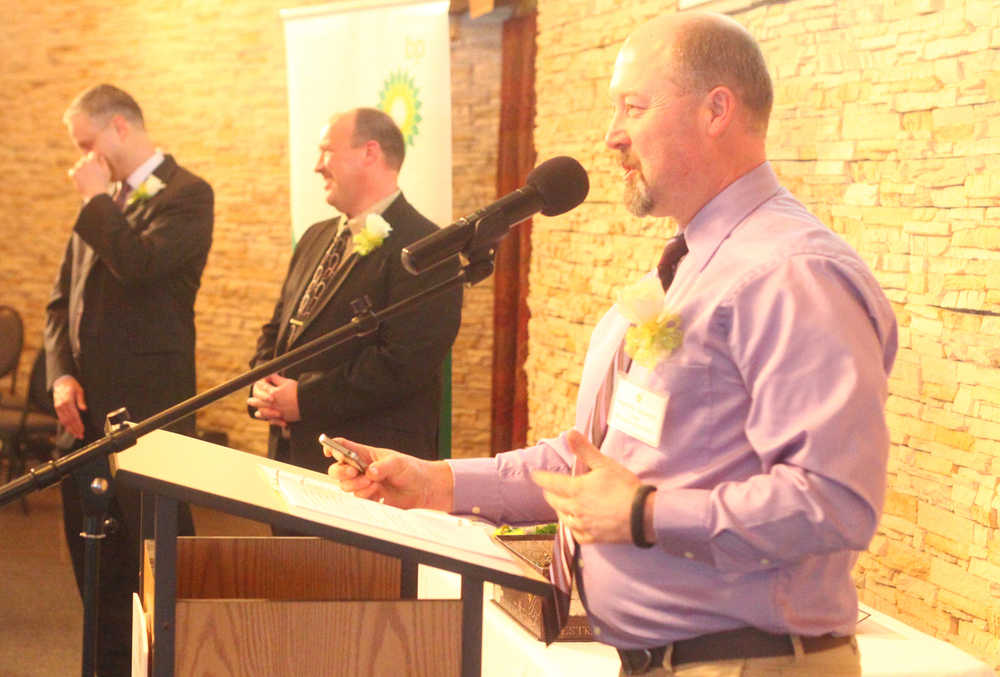 Photo by Kelly Sullivan/ Peninsula Clarion Matthew Widaman gives a speech at the Kenai Peninsula 2015 BP Teachers of Excellence award ceremony after winning Teacher of the Year Tuesday, April 28, 2015 at the Alaska Christian College in Soldotna, Alaska.