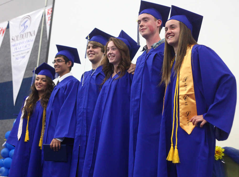 Photo by Kelly Sullivan/ Peninsula Clarion The 2015 Cook Inlet Academy graduating class poses for a group photograph Sunday, May 10, 2015, at Cook Inlet Academy in Soldotna, Alaska.