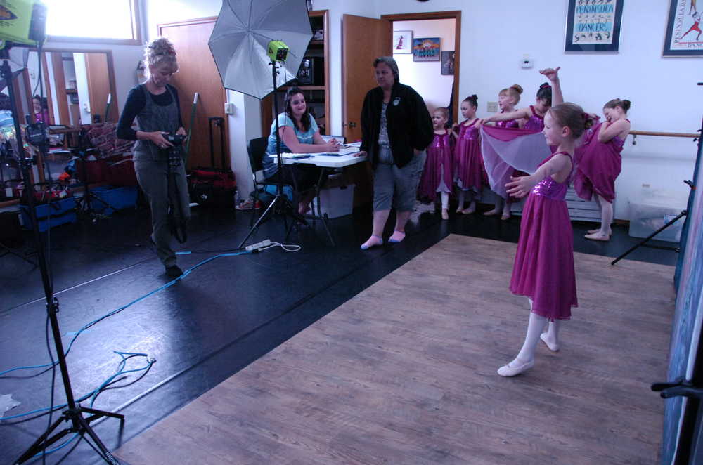 Photo by Kelly Sullivan/ Peninsula Clarion Dancers pose for photographs Monday at the Encore Dance Academy in Kenai in preparation for their spring recital. The recital is May 29 at 6 p.m. at Kenai Central High School, said academy owner Tara Slaughter.