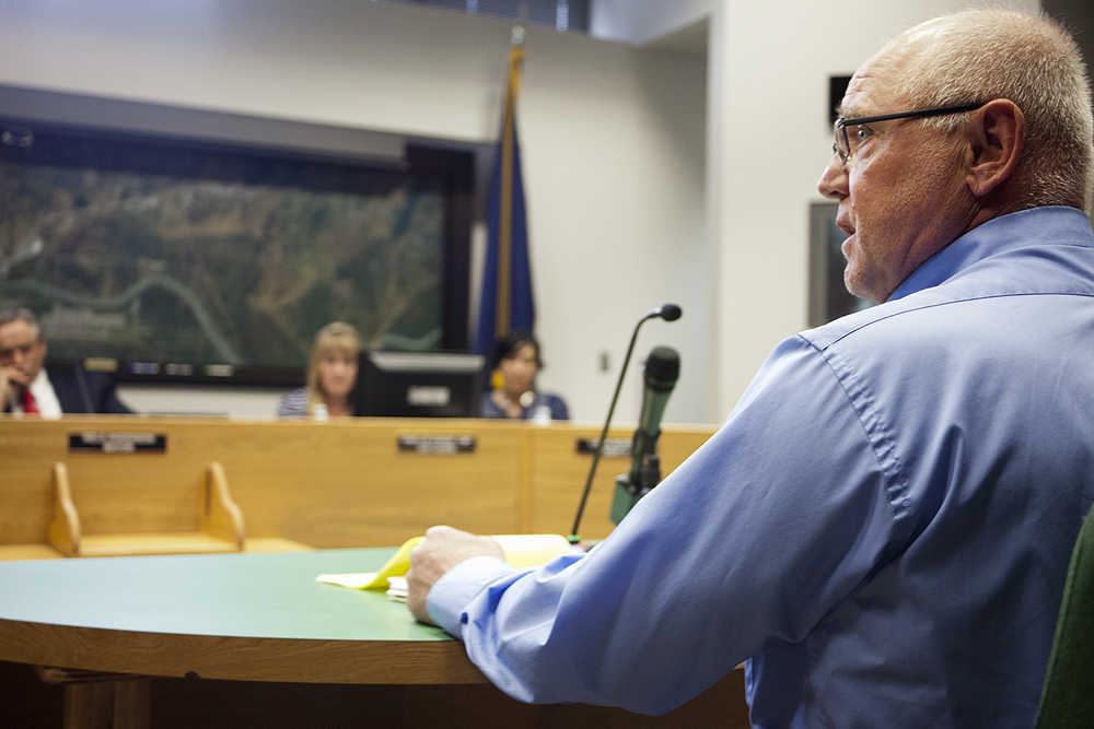 Photo by Rashah McChesney/Peninsula Clarion  Brian Olson, a borough resident and president of Borough Residents Against Annexation, was the first to testify before the Soldotna City Council on Wednesday May 13, 2015 during the public comment portion of an ordinance to appropriate $150,000 to study annexation in Soldotna, Alaska.