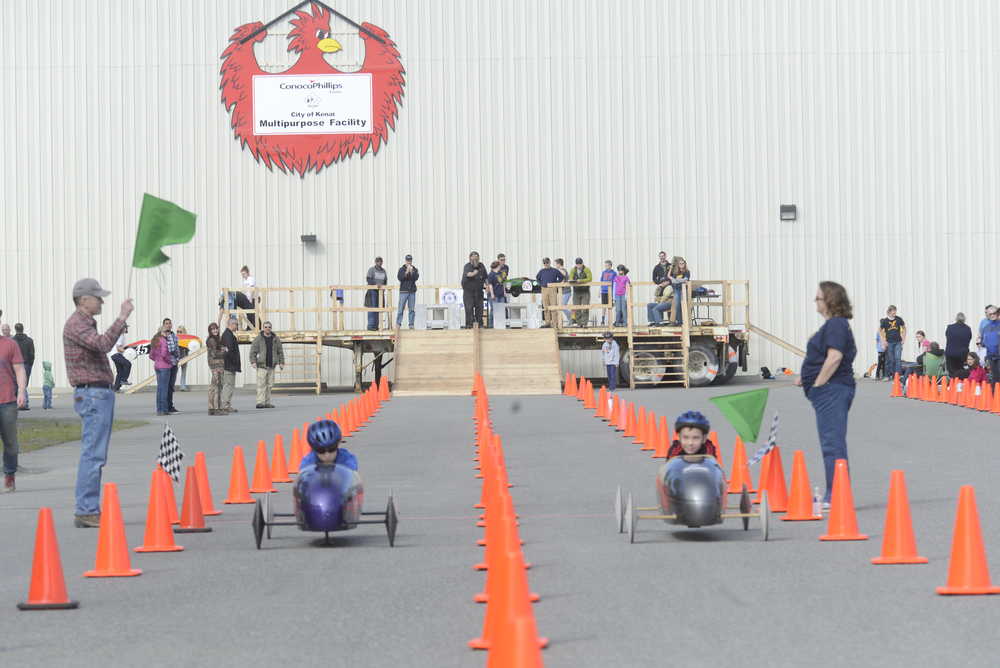 Ben Boettger/Peninsula Clarion Soapbox derby drivers compete during the Kenai Soapbox Derby in the parking lot of Kenai's Challenger Learning Center.