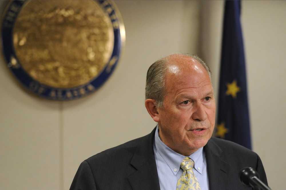 Alaska Gov. Bill Walker holds a news conference in Anchorage concerning his action on the budget on Monday, May 18, 2015. (Bill Roth/Alaska Dispatch News via AP)