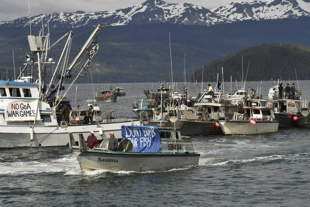 Protesters, demonstrating against the Navy's planned exercises, head out in commercial fishing boats on Orca Inlet, which opens onto the Gulf of Alaska, on Saturday, May 16, 2015, in Cordova, Alaska. They say the military activities could endanger critical fish habitats. (Mark Hoover/Eyak Preservation Council via AP)