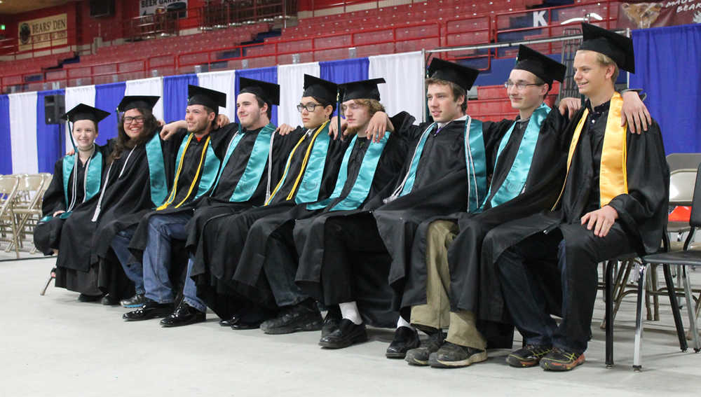 Photo by Will Morrow/Peninsula Clarion Members of the River City Academy Class of 2015 wait for the start of their commencement ceremony Monday, May 18, 2015 at the Soldotna Regional Sports Complex.