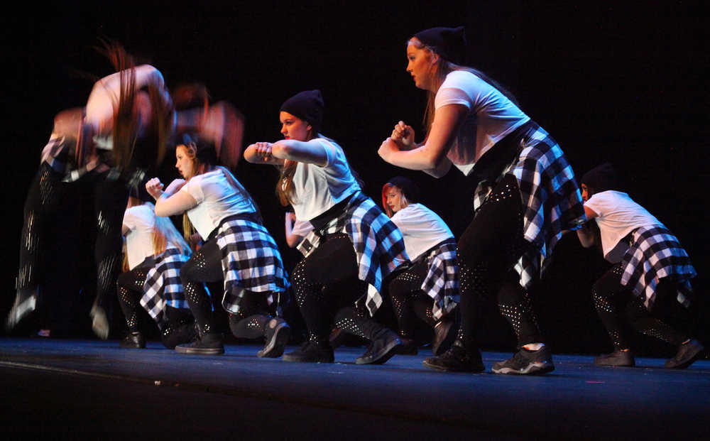 Photo by Kelly Sullivan/ Peninsula Clarion A Hip Hop group performs during the first act of Vergine's Dance Studio Annual Recital Saturday, May 23, 2015 at Kenai Central High School in Kenai, Alaska.