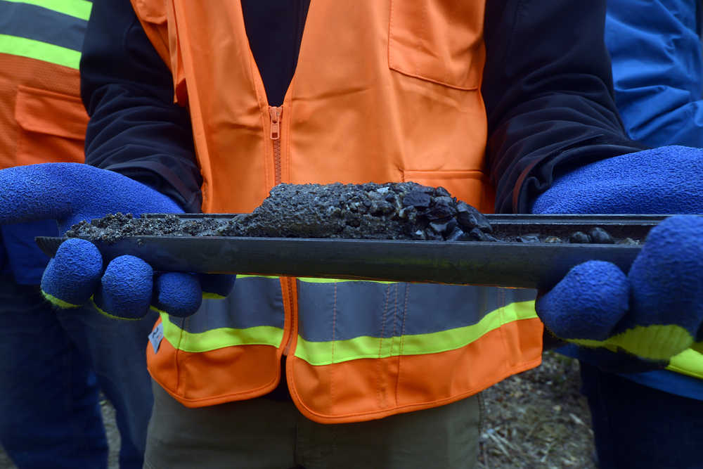 Photo by Rashah McChesney/Peninsula Clarion  Workers took a core sample of the earth near Autumn Road, Thursday October 9, 2014 in Nikiski where the Alaska LNG project has been buying land and planning to build an LNG facility at the terminus of a pipeline in a project that, if built, would be the largest of its kind in the world.