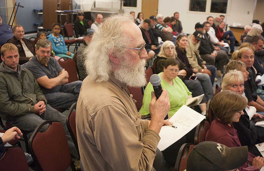 Photo by Rashah McChesney/Peninsula Clarion  Dean Bartsch, of Nikiski, talks to a room full of people about a potential law enforcement area on Thursday June 4, 2015 at the Nikiski Community Center in Nikiski, Alaska.