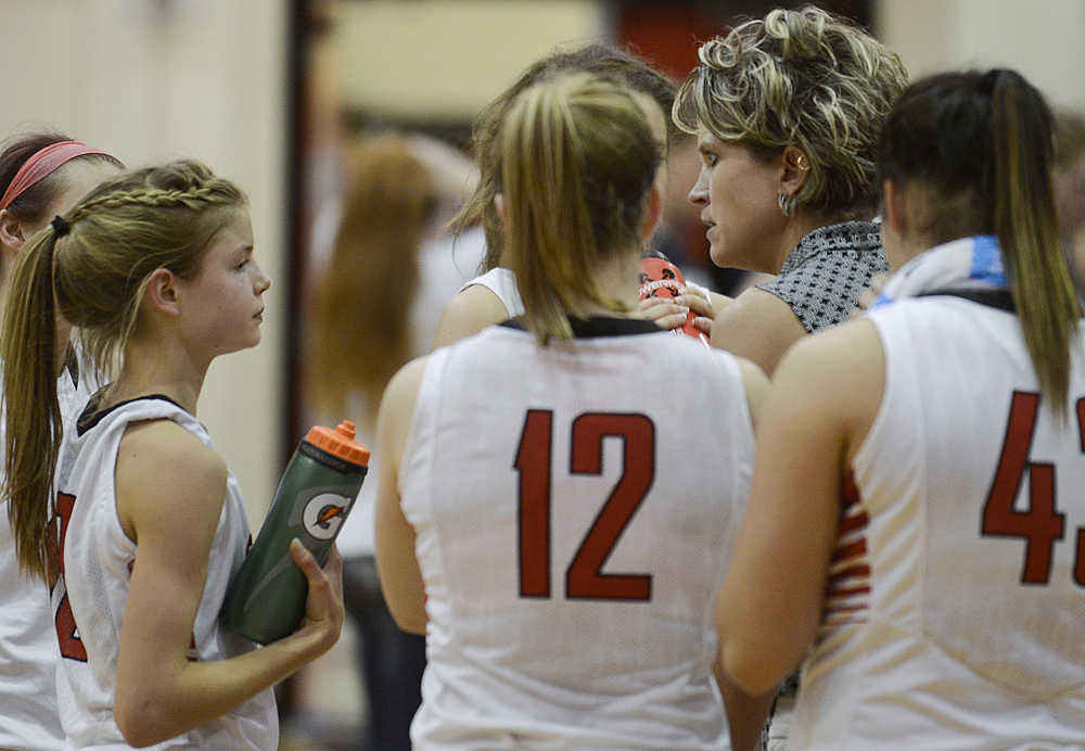 Photo by Rashah McChesney/Peninsula Clarion In this Feb. 28, 2015 file photo Kenai Central High School women's basketball coach Stacia Rustad talks her team through a strategy during a game against Soldotna High School. Rustad is moving to Wasilla to become the athletic director for Wasilla High School.